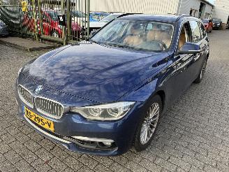 uszkodzony lawety BMW 3-serie 320i Automaat Stationcar Luxury Edition 2019/3
